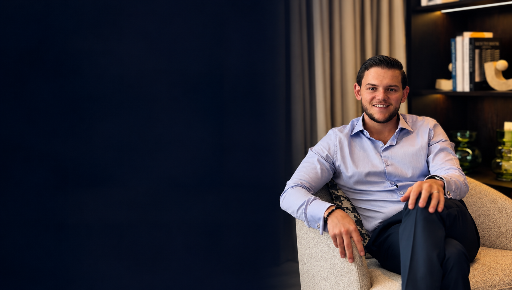 Tobias H. Kramer seated in the office